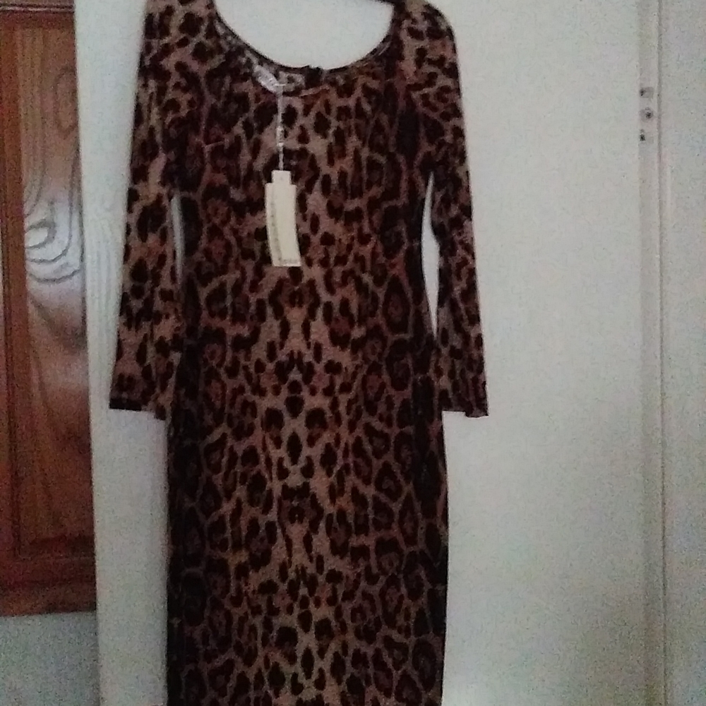 Leopard print, quarter length sleeves, dress by Diso, size medium USA 6